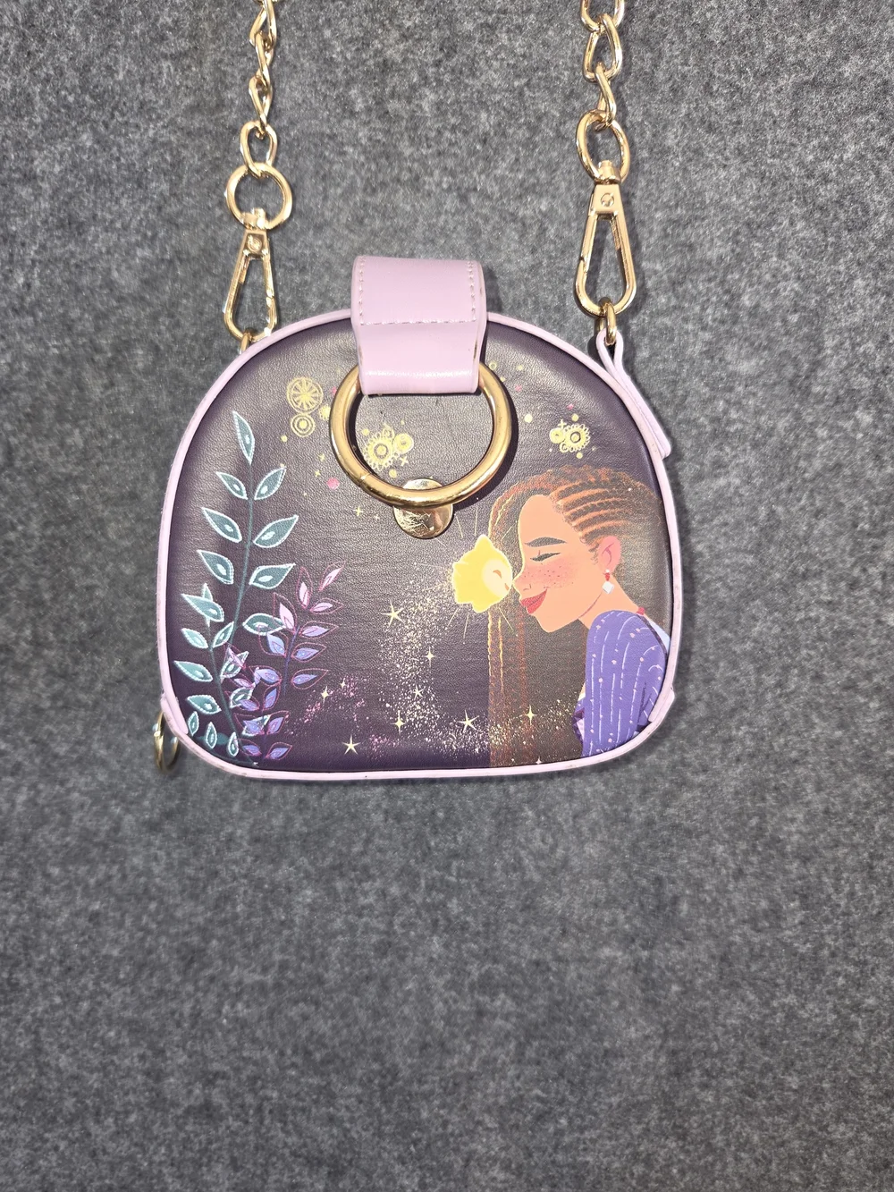 Enchanting crossbody bag features Asha from Disney's 'Wish' animated film,